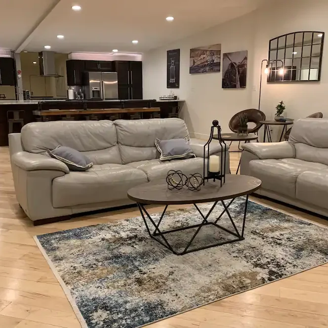 A living room with couches and a coffee table